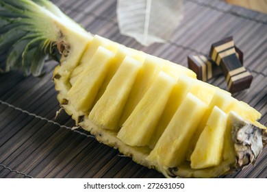 Sliced Flesh Pineapple On Bamboo Luncheon Mat
