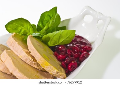 Sliced Foie Gras With Cumberland Sauce And Basil Leaves