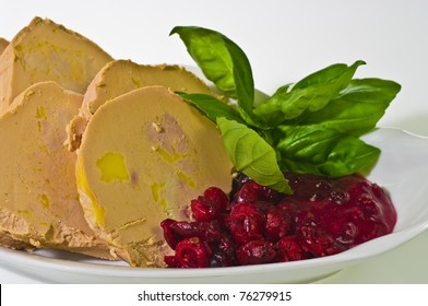 Sliced Foie Gras With Cumberland Sauce And Basil Leaves