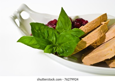 Sliced Foie Gras With Cumberland Sauce And Basil Leaves