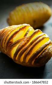 Sliced Foil Baked Jacket Potato Cooked On A Summer BBQ, Close Up View Of The Texture Of The Sliced Vegetable Ready To Be Served