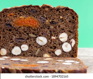 Sliced Fresh Soft Bread With Filling, A Loaf Of Bread With A Crispy Crust And The Addition Of Nuts And Dried Fruits, An Oval Loaf Of Rye Bread With Hazelnuts And Dried Fruit