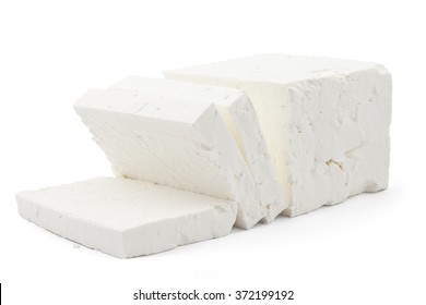 Sliced Fresh White Cheese From Cow's Milk On White Background