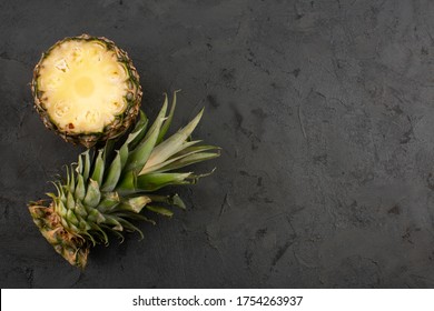 sliced fruit fresh ripe pineapple on a grey background