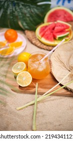 Sliced Fruits And Lemongrass Drink At The Beach