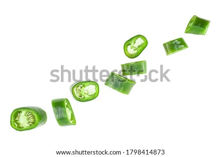 Sliced green chili pepper isolated on a white background. Green chili pepper rings.