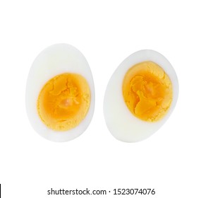 Sliced Hard Boiled Egg On White Background