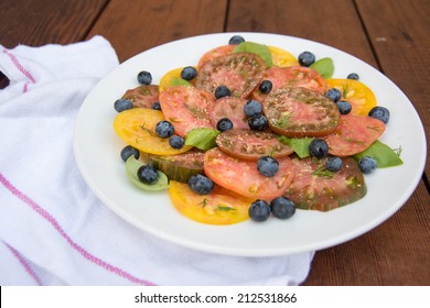 Sliced Heirloom Tomatoes Sliced And Served On Plate