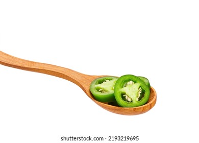 Sliced Jalapeno Pepper In Wooden Spoon Isolated On White Background, Close-up.