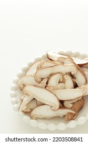 Sliced Japanese Shiitake Mushroom On White Dish