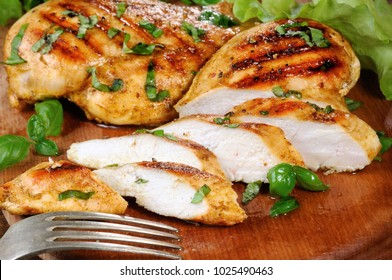 Sliced juicy, tender chicken breast grill close-up.