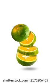 Sliced King Orange Fruit Or Calamansi, Green Orange Fruits Isolated On White Background. Levity Fruit Floating In The Air.