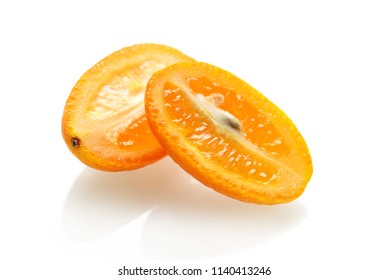 Sliced Kumquat On White Background
