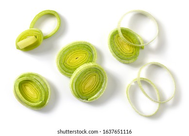 sliced leek isolated on white background, top view