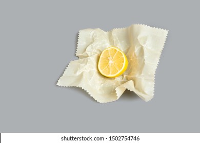 Sliced Lemon Half In Cloth Beeswax Food Storage Wrap / Ecological Alternative To Plastic Cling Wrap