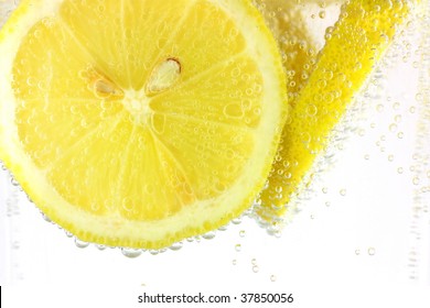 Sliced Lemon In Refreshing Fizzy Water