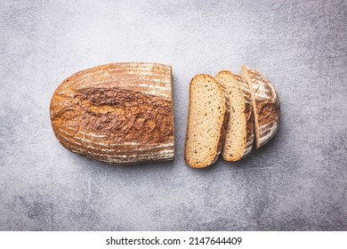 Sliced Loaf Of Bread On Kitchen Table. Top View.