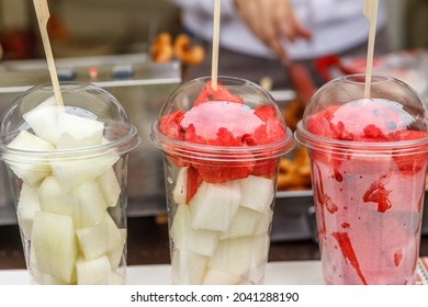 Sliced Melon And Watermelon In A Plastic Cup. The Concept Of Fortification.