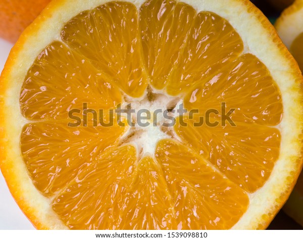 Sliced orange fruit to
squeeze