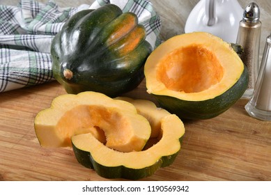 Sliced Organic Acorn Squash On A Cutting Board 