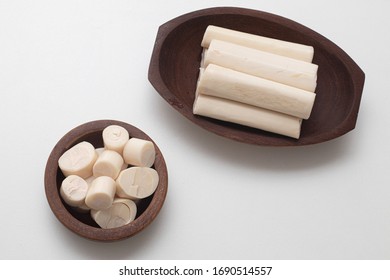 Sliced palm heart in a bowl on a white background