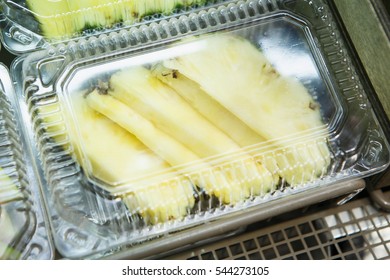 Sliced Pineapple Fruits In Plastic Container On Sale At Grocery Store.Refrigerator With Natural Diet Foods For Healthy Eating,diet Nutrition.Download Royalty Free Curated Images Collection With Food