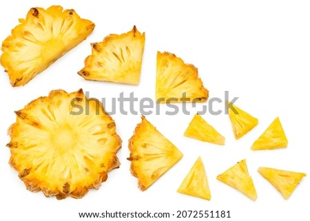 sliced pineapple isolated on white background. exotic fruit. top view