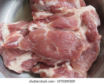 Sliced Pork Blade Shoulder or Pork Neck is slightly fatty and most often used cured for bacon or inexpensive diced or minced pork