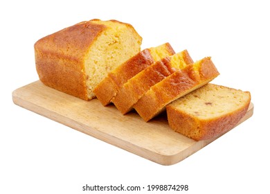 Sliced pound cake with lemon glaze on a cutting board isolated on a white background.