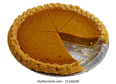 A Sliced Pumpkin Pie In A Tin, Isolated On A White Background.