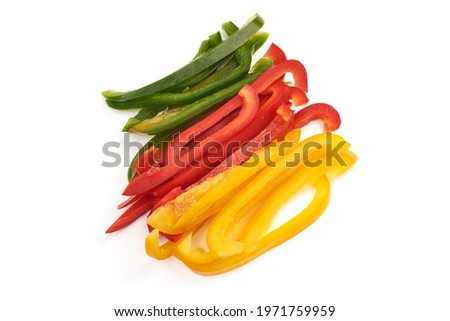 Sliced red, green, yellow bell pepper, isolated on white background. High resolution image.