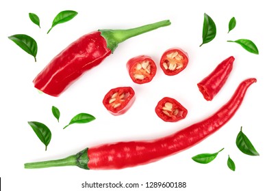 sliced red hot chili pepper decorated with green leaves isolated on white background. Top view. Flat lay pattern