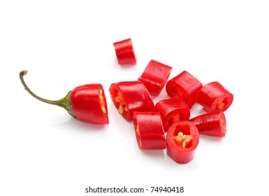 Sliced Red Hot Chilli Pepper Over White Background