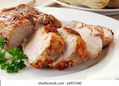 Sliced Roast Pork On A Plate