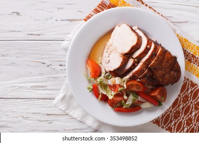 Sliced Roasted Turkey Breast And Fresh Vegetables On The Plate. Horizontal Top View
