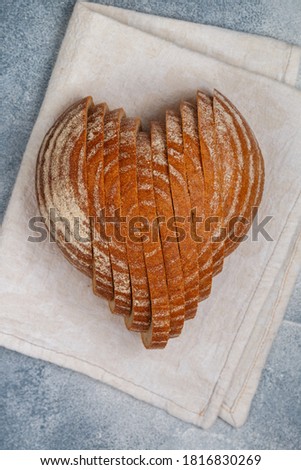 Similar – Image, Stock Photo baked round rye bread with sunflower seeds