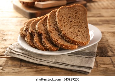 Sliced Rye Bread On Wooden Table Closeup