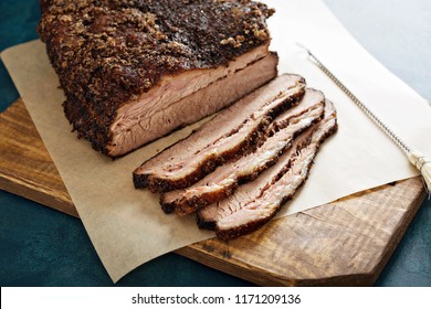 Sliced slowly cooked brisket with bbq sauce