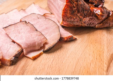 Sliced Smoked Boar On Wooden Board