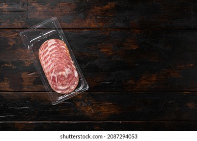 Sliced Smoked Meat Vacuum Package Set, On Old Dark  Wooden Table Background, Top View Flat Lay, With Copy Space For Text