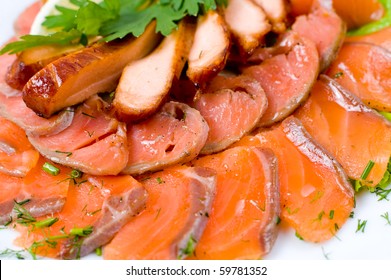 sliced smoked salmon and meat