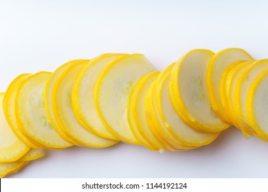 Sliced Summer Yellow Squash On White Background