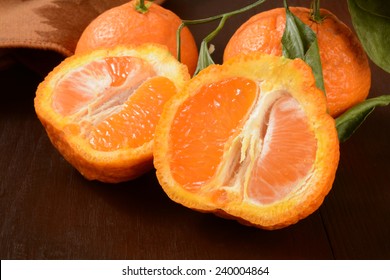 Sliced Sumo Oranges, A Wrinkly Sweet Orange That Is A Cross Between A Mandarin And California Navel Orange