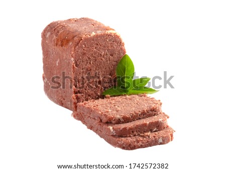 sliced tinned corn beef with garnish isolated on a white background 
