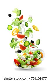 Sliced vegetables falling into bowl with salad on white background