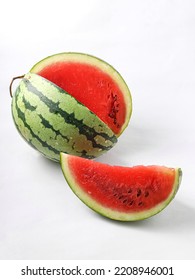 Sliced ​​whole Watermelon, On A White Background