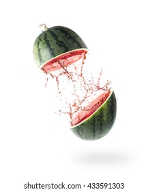 Sliced Watermelon and splash isolated on white