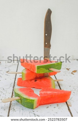 Similar – Image, Stock Photo Red fruit ice cream on a stick