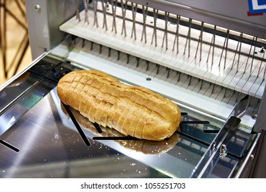 Sliced White Bread In A Cutting Machine