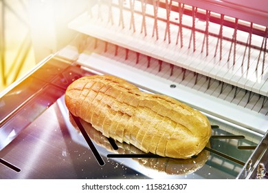 Sliced White Bread In A Cutting Machine